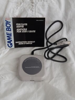 Nintendo Game Boy Four Player Adapter in Light Gray with Black Cable